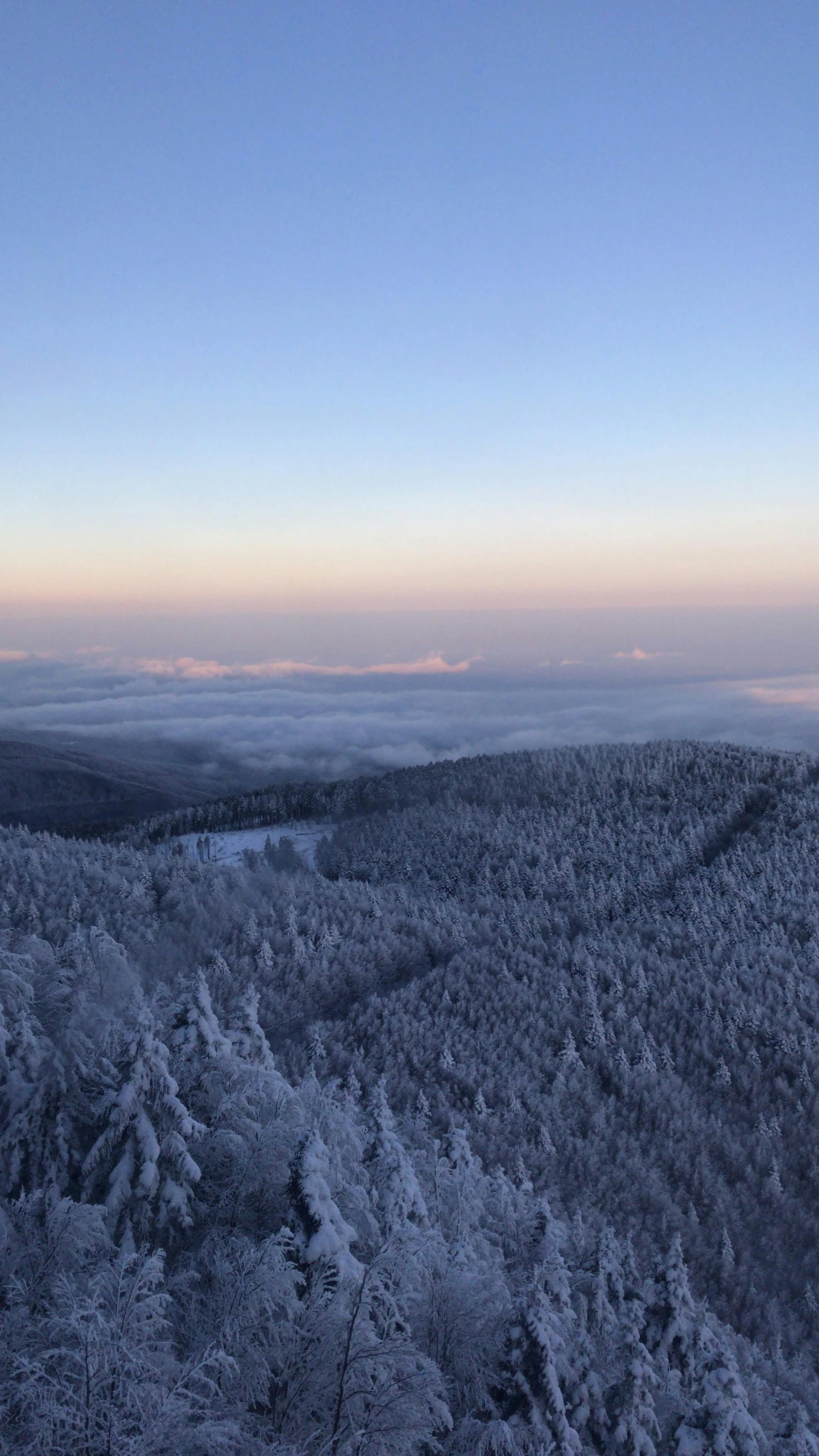 a view of the top of a snowy mountain