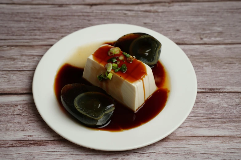 small plate with food on wooden table