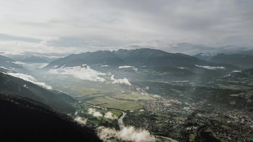 an aerial view from a plane flying over the town