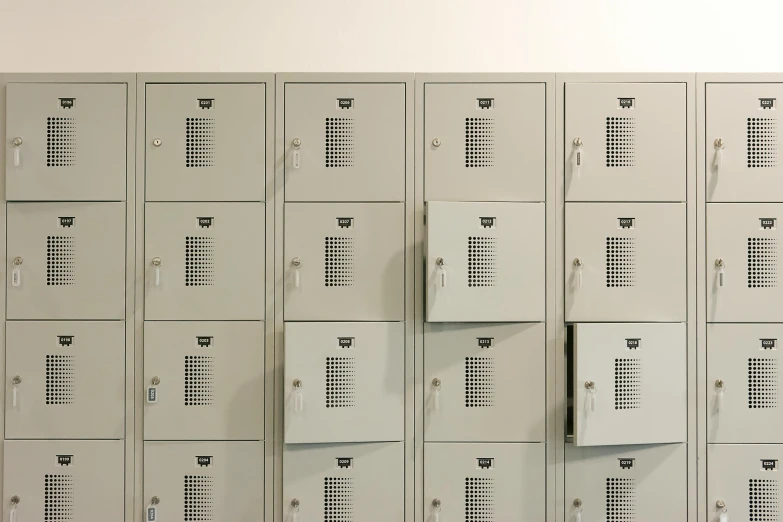 a bunch of white lockers that are next to each other