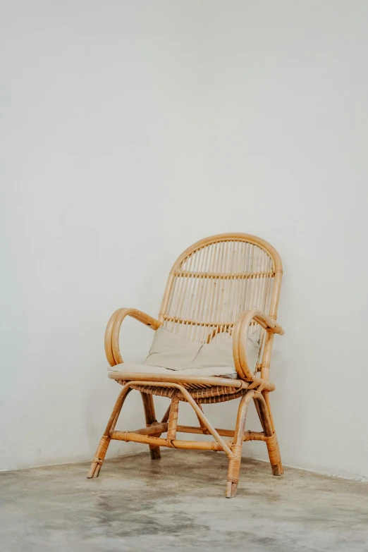 this is a chair in front of a white wall