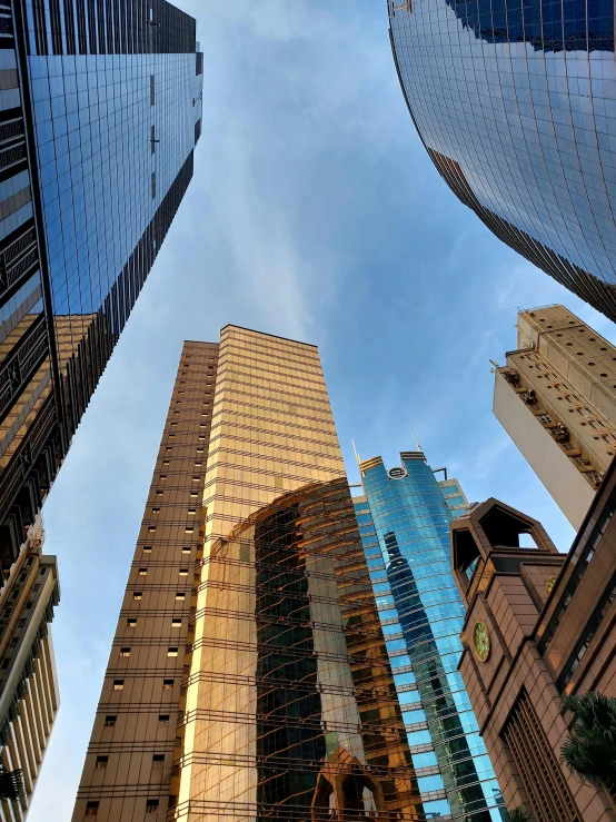 three different building structures in an open area