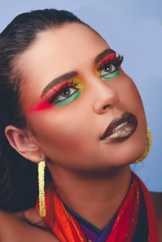 a woman with bright, colorful eye shadows