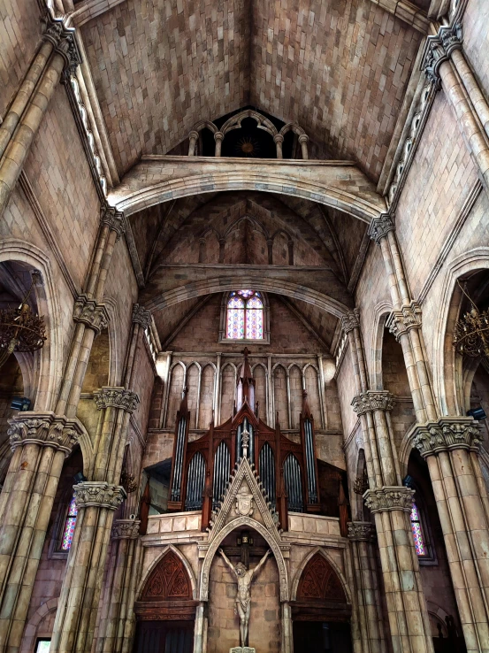 an architecturally detailed image of a large cathedral with a pipe organ