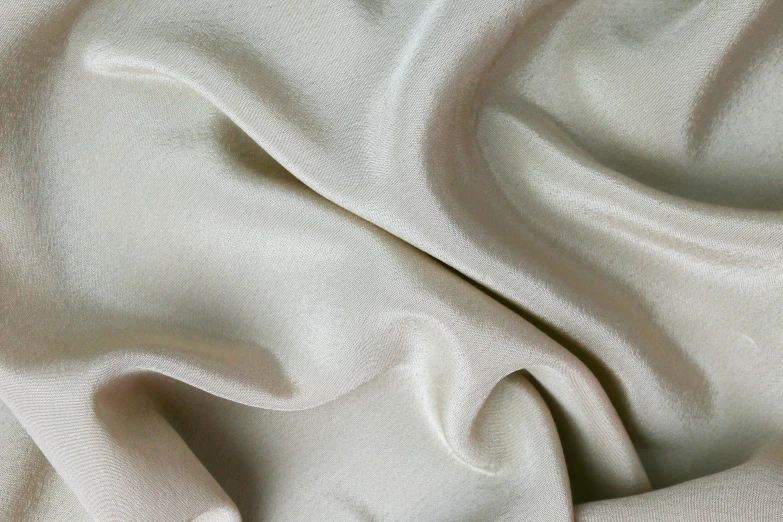 a white fabric with very little texture