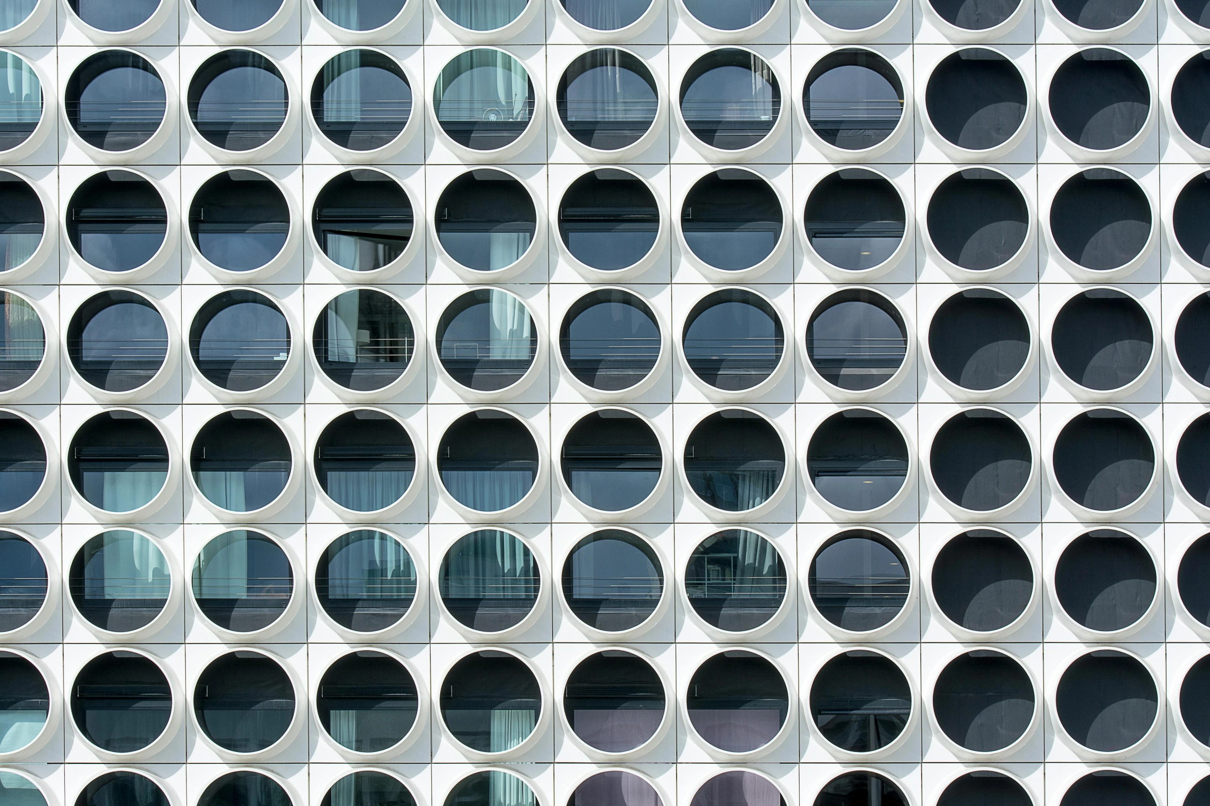 an exterior with lots of circles on the building