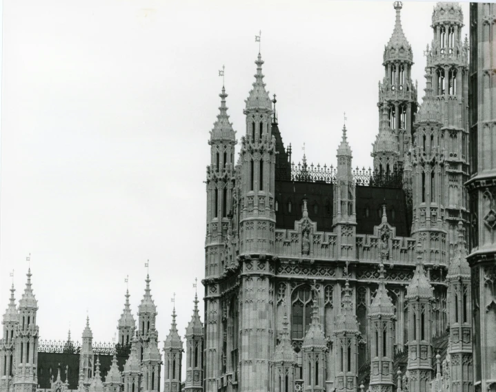 the top of a building with a large clock on it