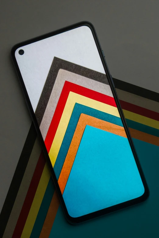 a colorful case with a black frame sits on the ground