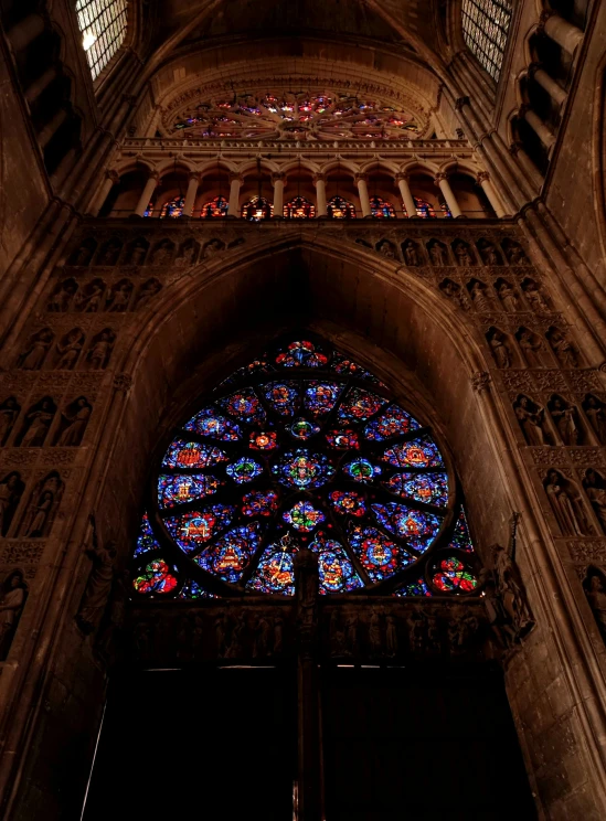 a cathedral with a large stained glass window