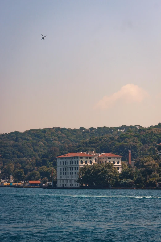 a large house and apartment on the water