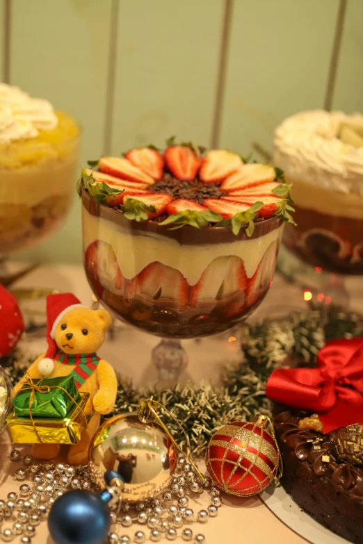 desserts that are on a table, including cake and ornaments