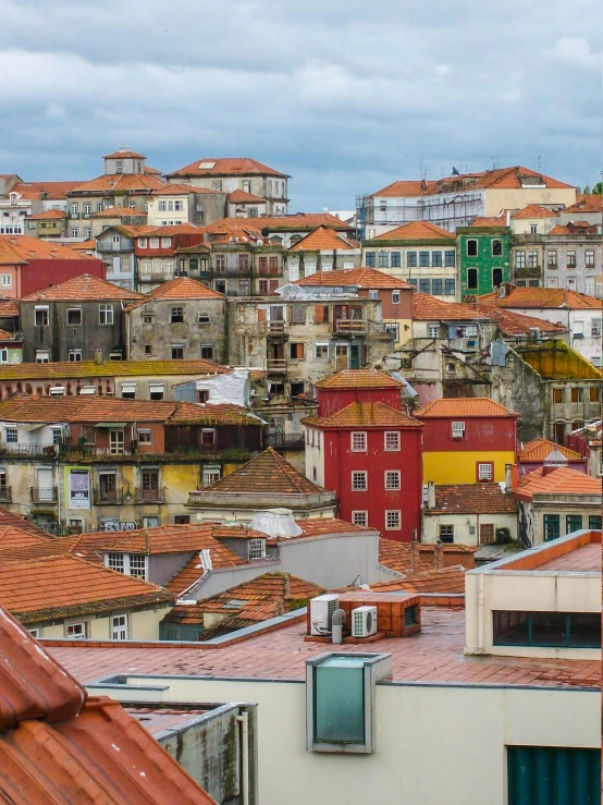 the view over the top of a city with rooftops