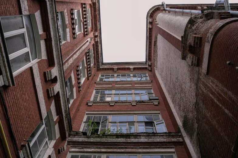 a tall building with a sky background