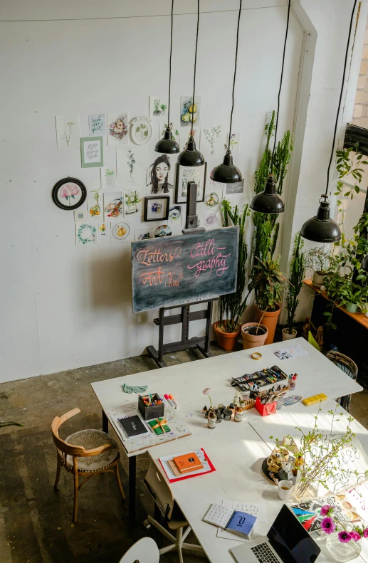 a room filled with a table and chairs