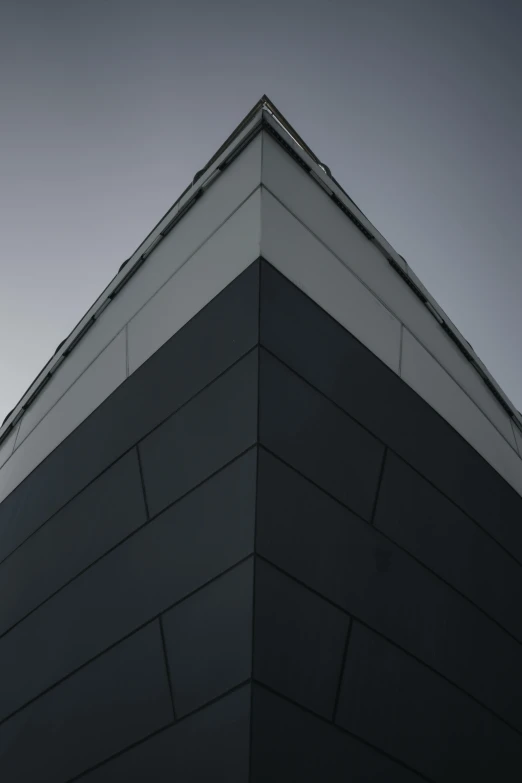 the top of a building that has an open sky above it