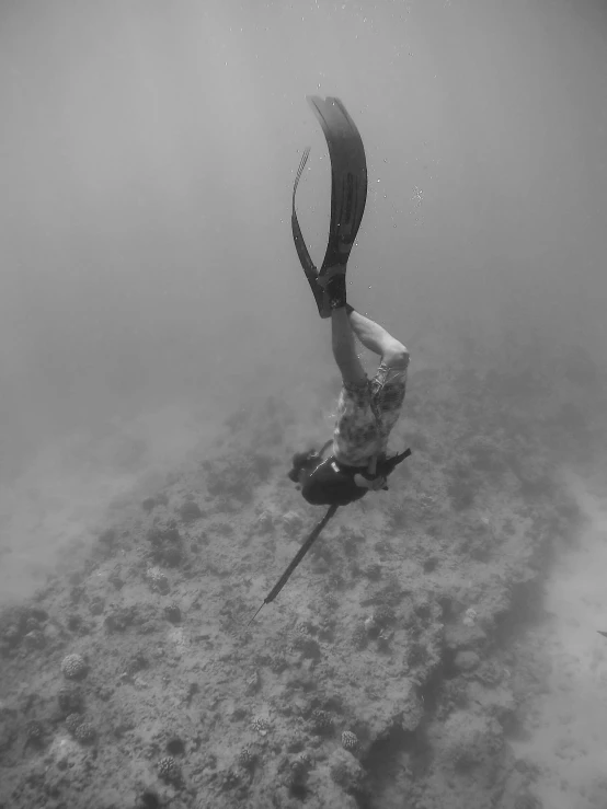 a man is submerged in water in an ocean