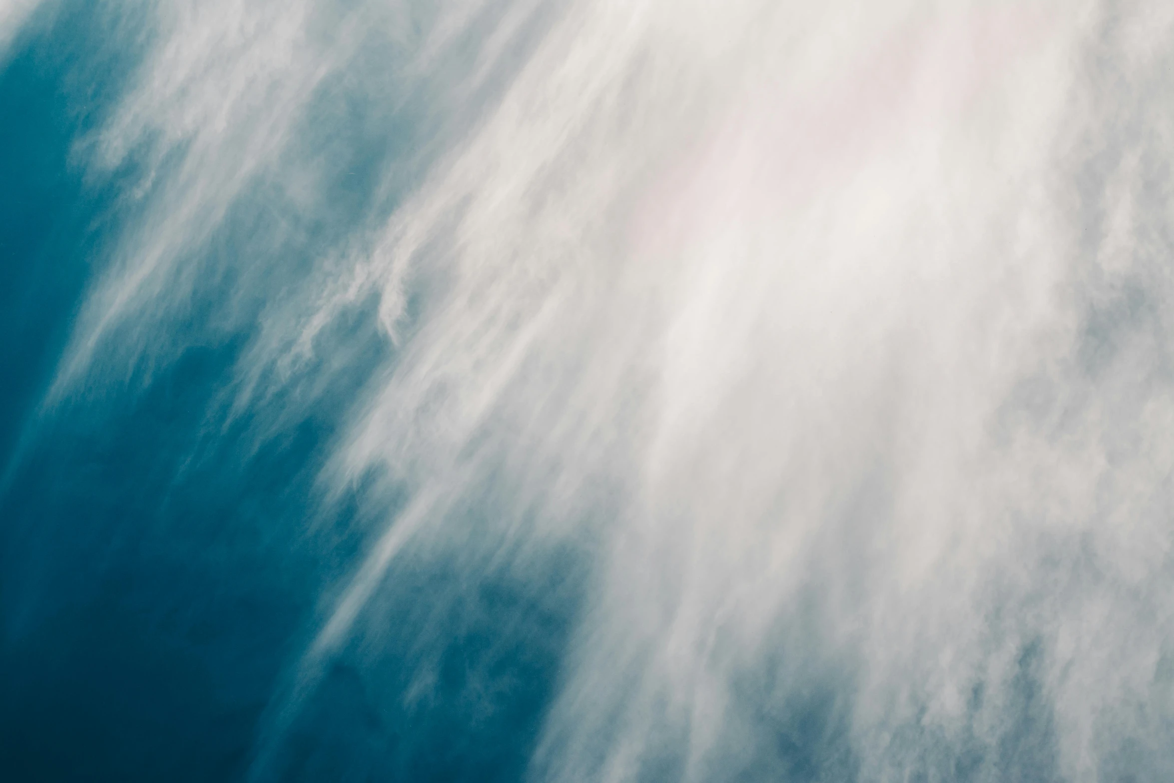 a blue sky with some clouds in it