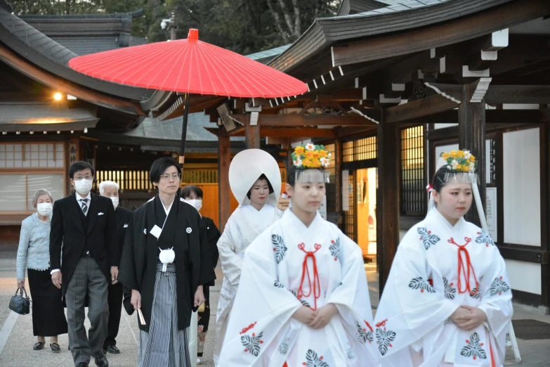 group of asian women dressed in traditional costumes