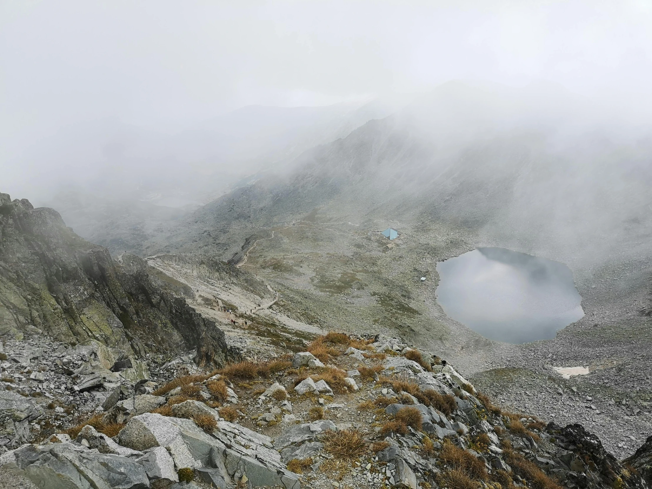 there are no clouds or trees on this mountain