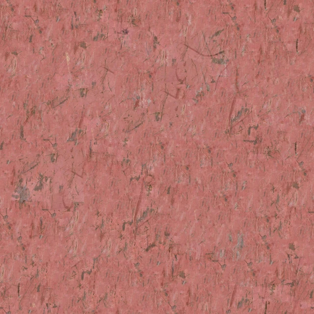 a small brick wall covered in pink colored sand