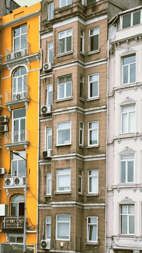 this picture shows several buildings that are in different colors