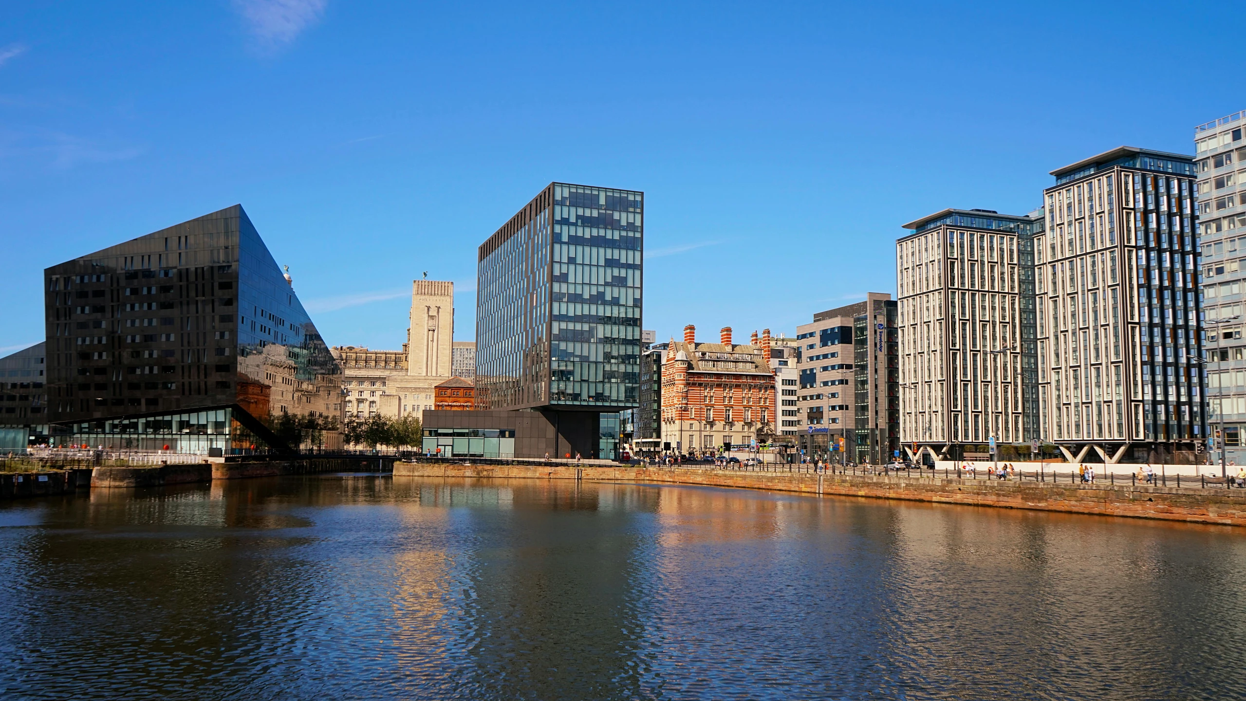 there are many buildings all along this body of water