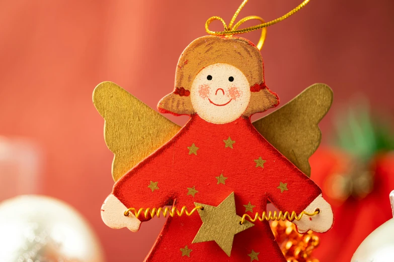 an angel ornament sits atop decorations