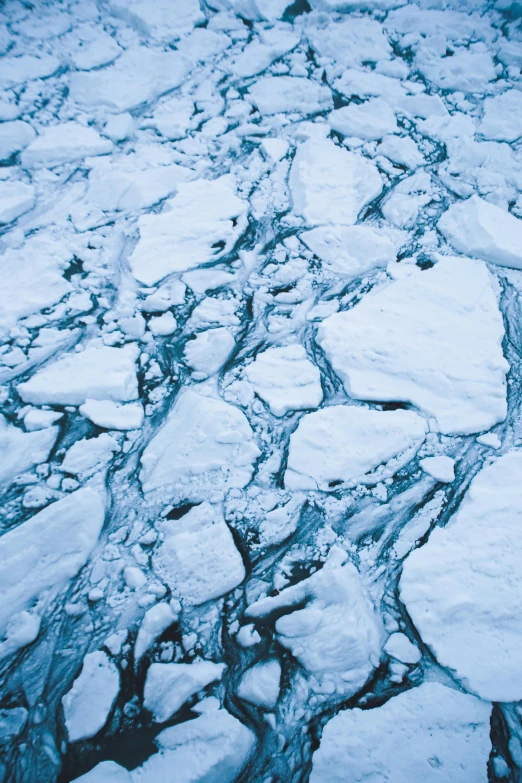 water flowing over ice on the ocean