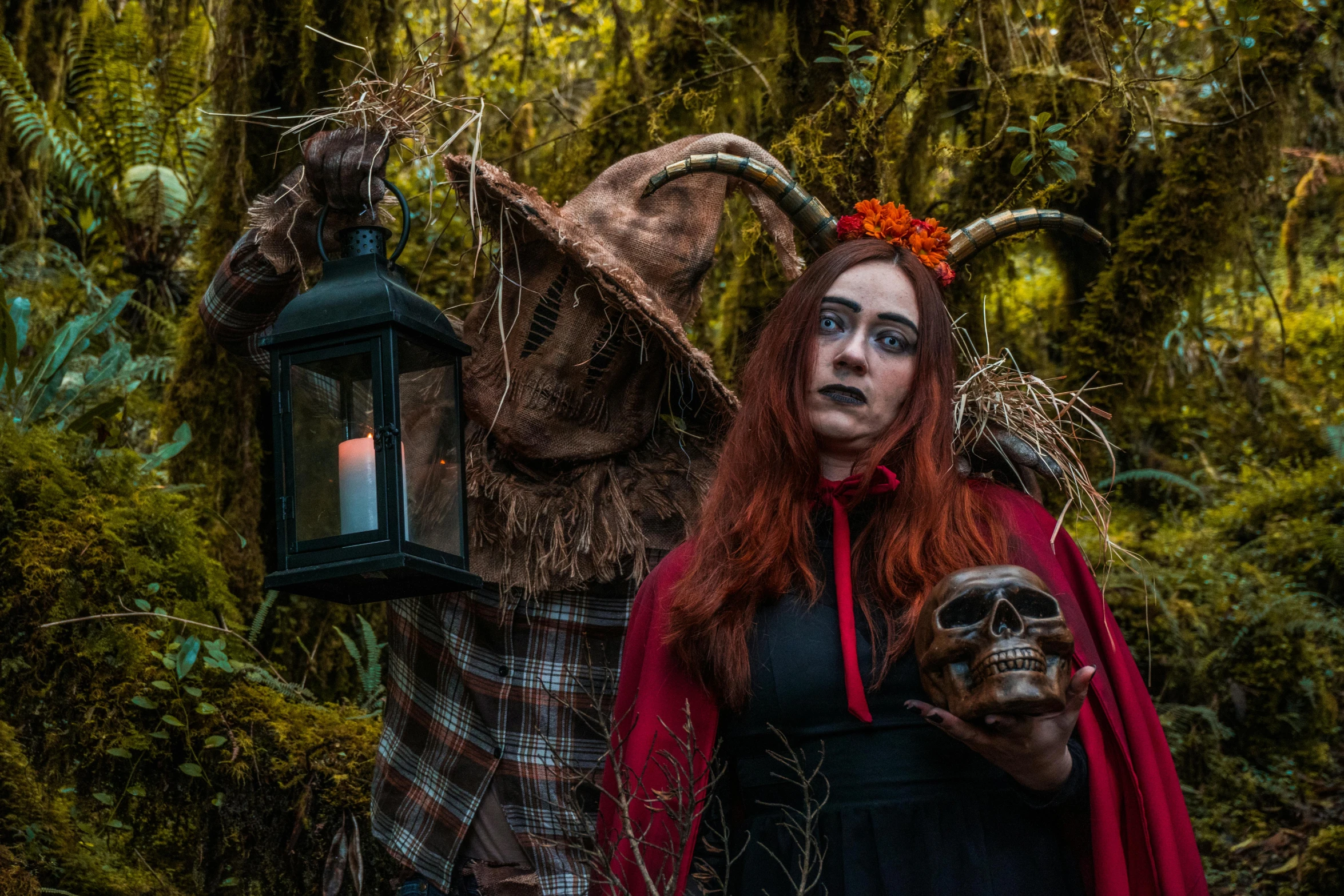 a woman in her makeup and head piece holding a lantern