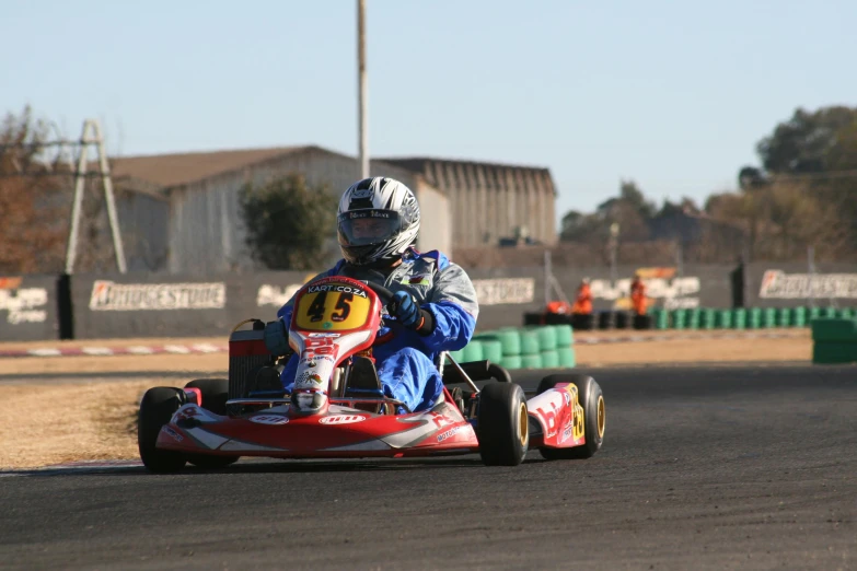 a man on a kart racer in motion