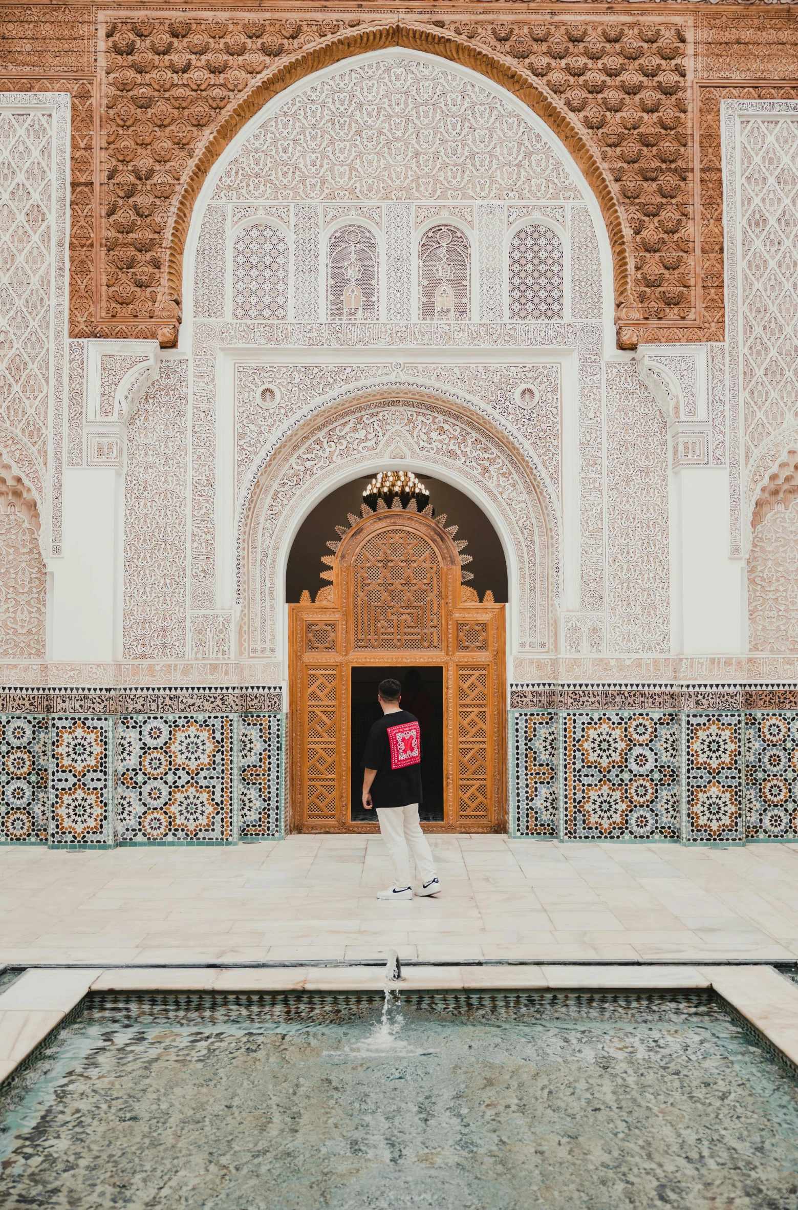 a beautiful view of a courtyard, and an old wood door