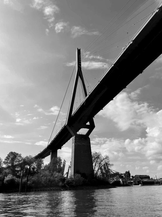 a black and white image of the underside of a bridge