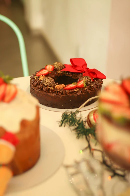 two small cakes sitting on top of plates