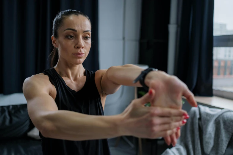 a woman is engaged in exercises for her friend