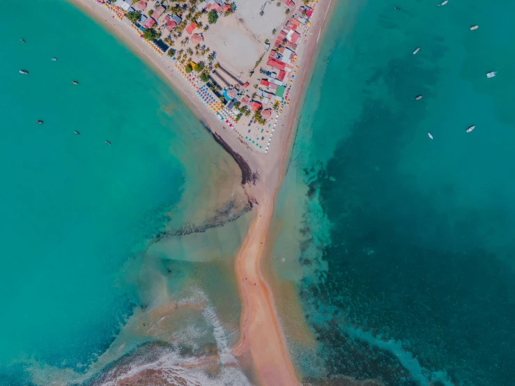 a bird - eye view of an ocean with clear blue water