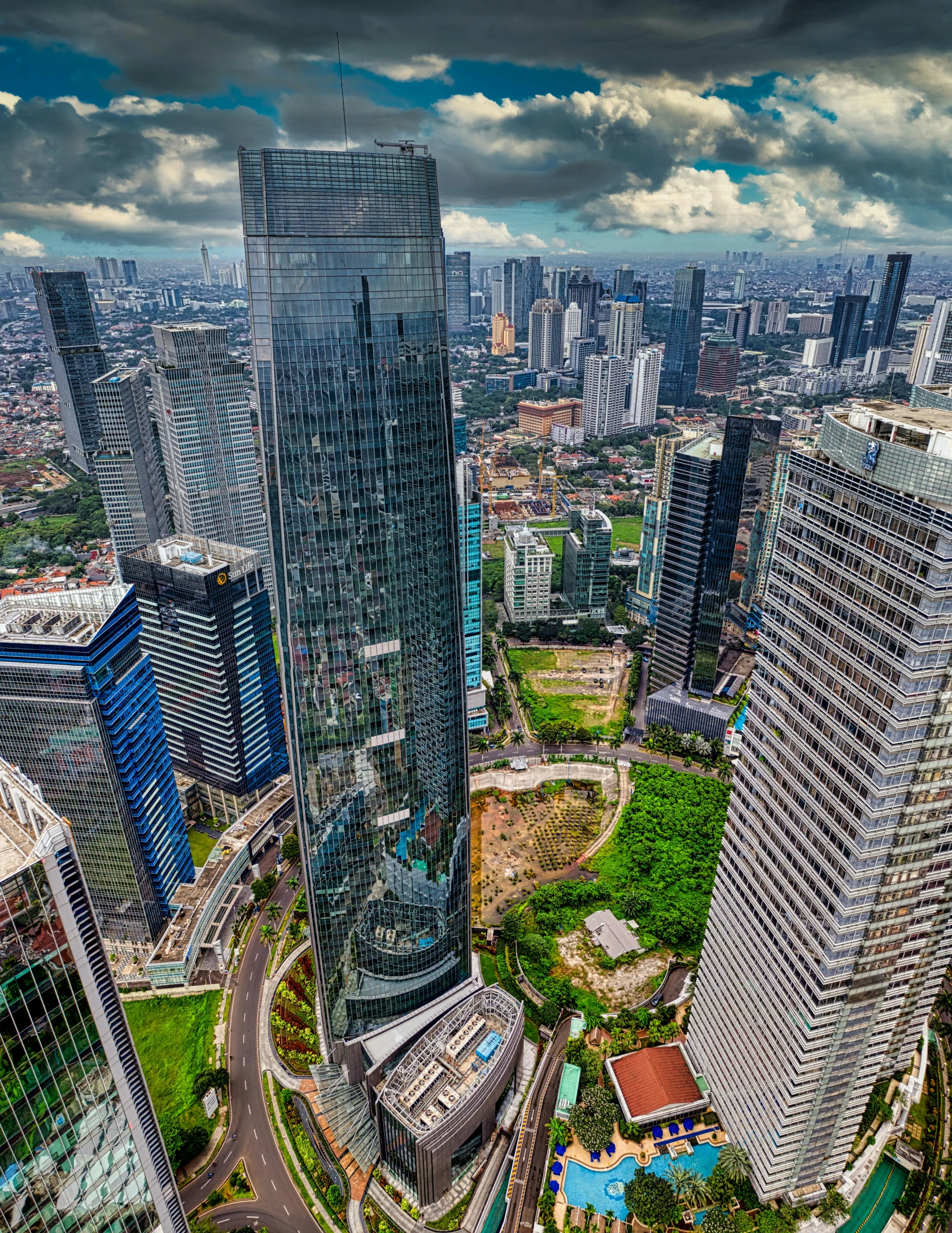 a group of large skyscrs towering over a city