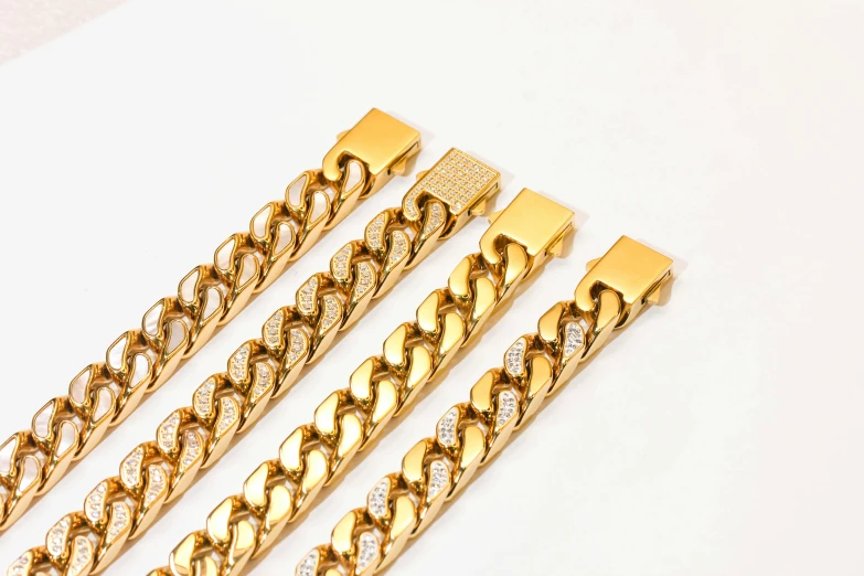 a set of four gold necklaces