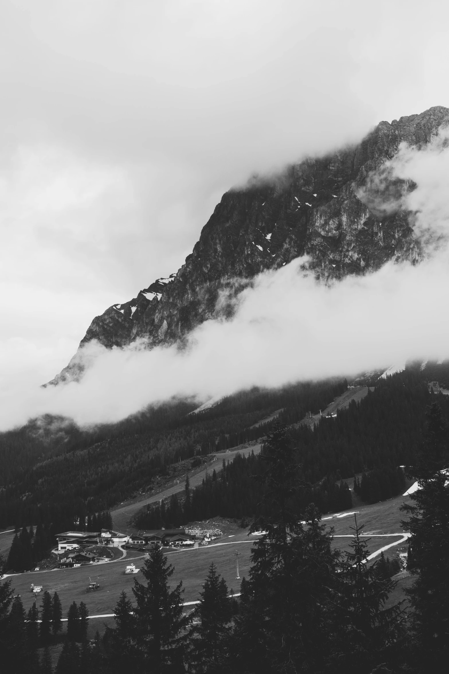 an old mountain is in a black and white po