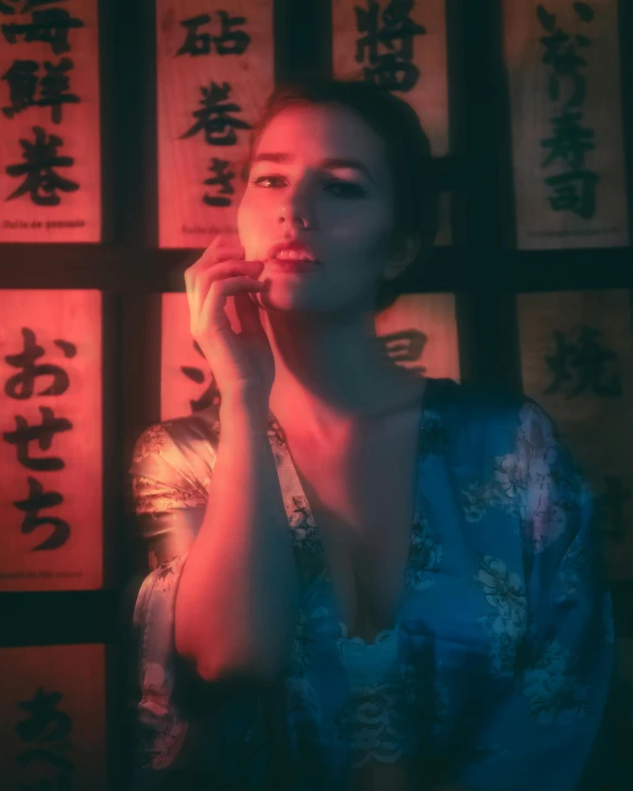 asian woman in silk kimono and a wall