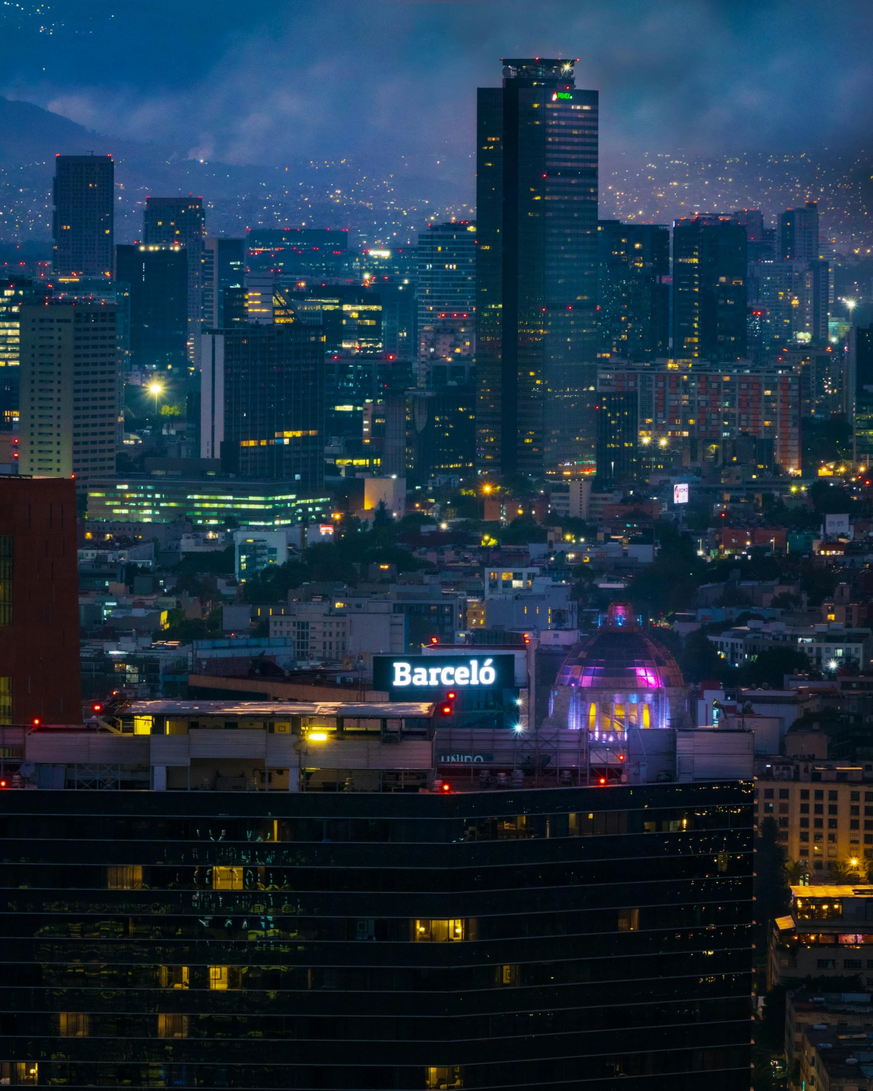 a city view from the top of a skyscr at night