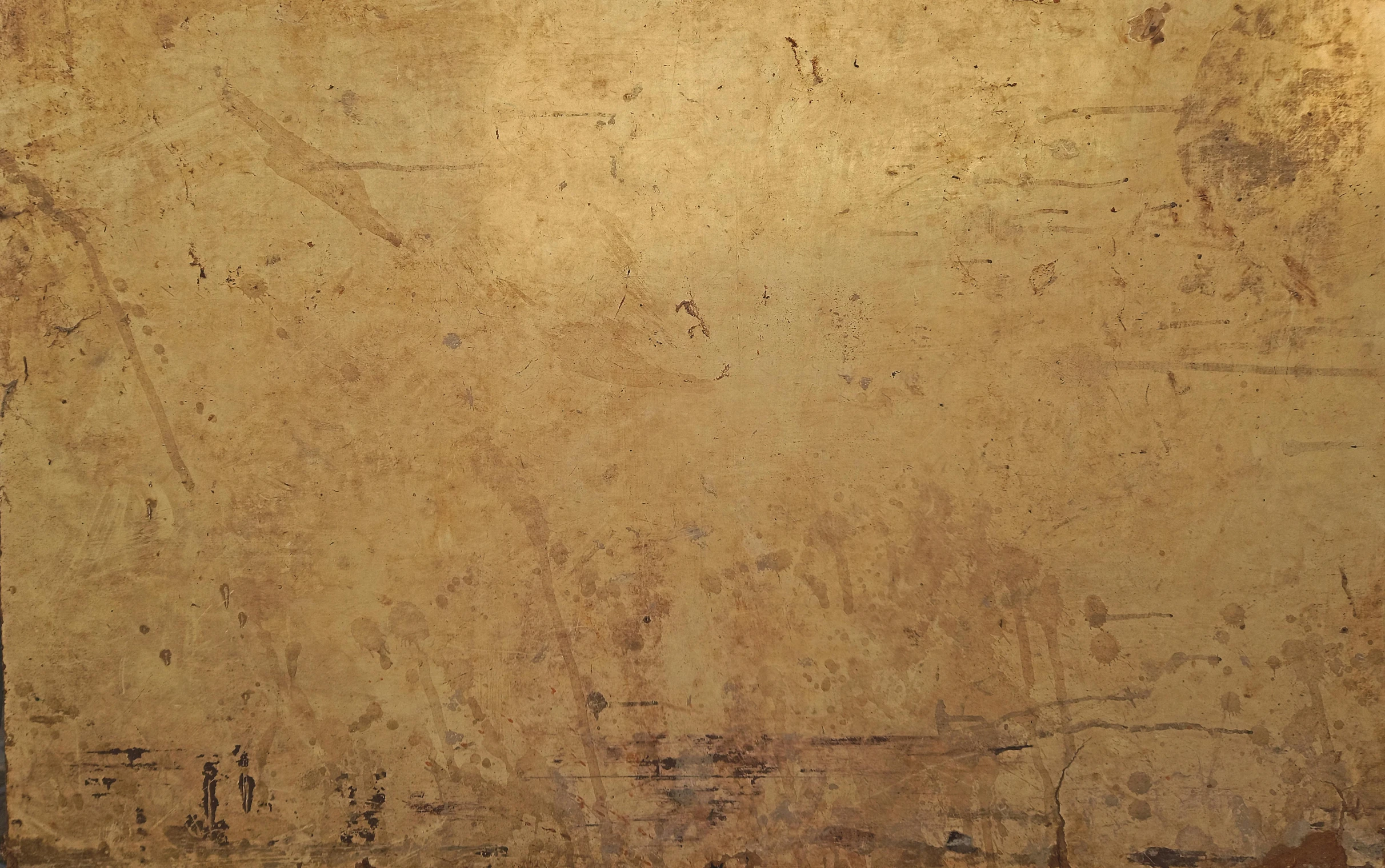 a brown grungy wall texture with rough stains