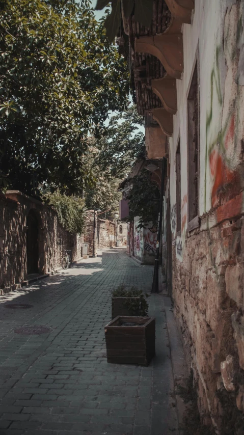 there are some containers sitting on a street