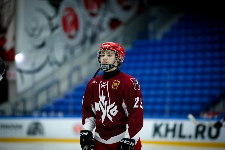 the canadian hockey player is waiting for his turn