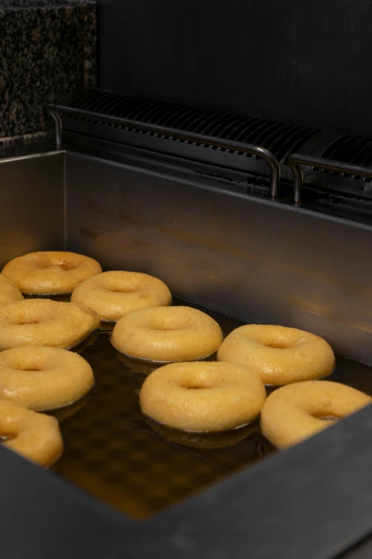 a bunch of doughnuts are sitting on a table