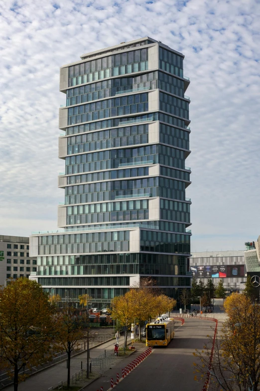 the building is surrounded by glass and silver