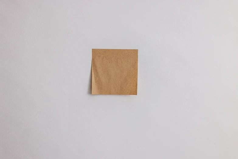 a piece of cardboard nailed to the wall