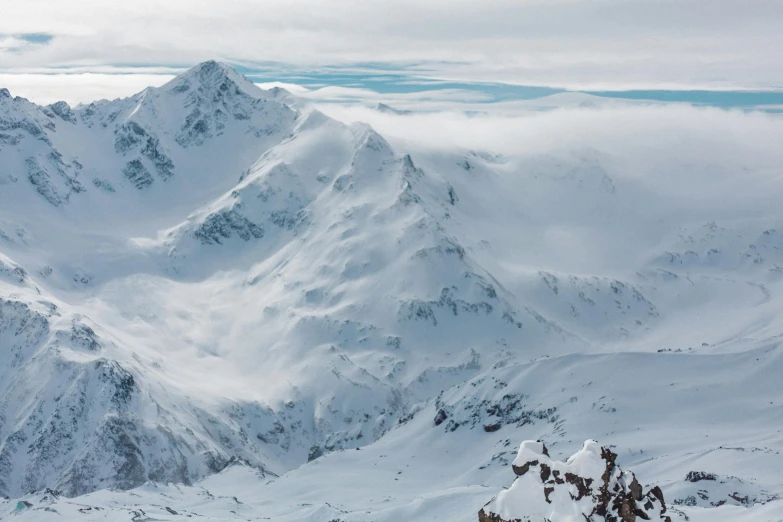 two people are on skis in the snow