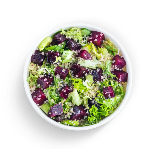 a salad with broccoli and purple onions in a white bowl