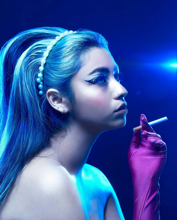 a woman smoking a cigarette and blue hair
