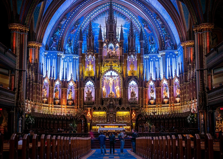 the interior of a cathedral lit up at night